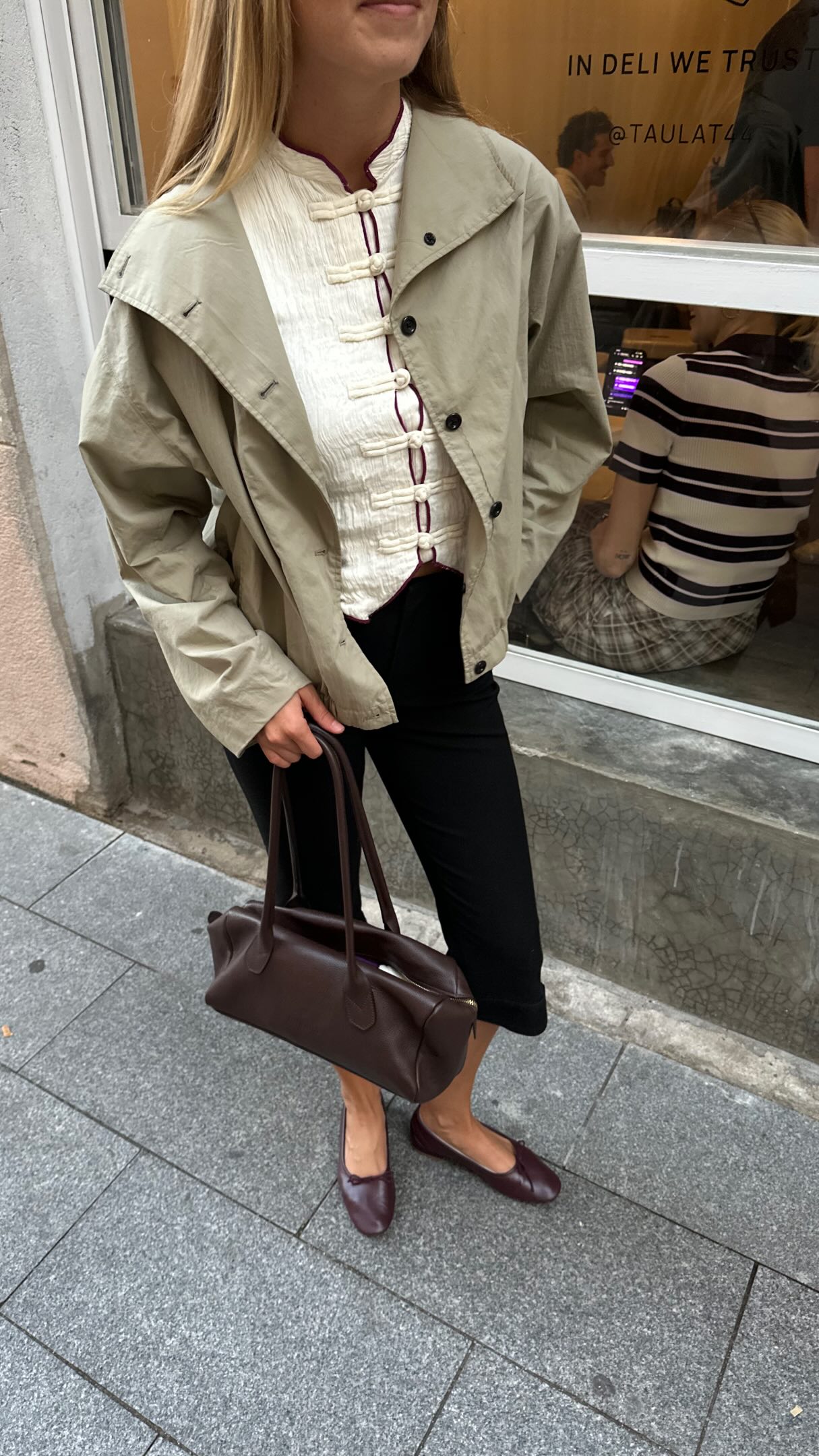 Maria walking through the city